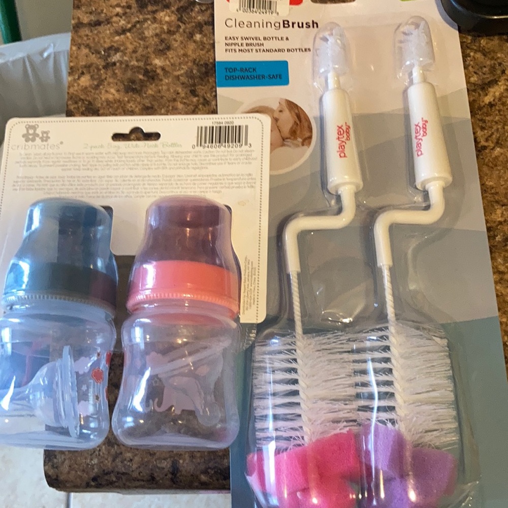 Baby cleans brush and bottles